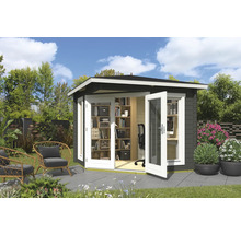 Abri de jardin avec double porte ouverte, étagères et bureau dans le jardin