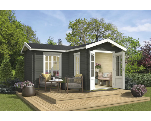 Abri de jardin avec terrasse, mobilier de jardin et plantation