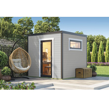 Jardin avec maison de jardin moderne, fauteuil suspendu en osier et décoration