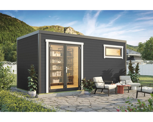 Abri de jardin Outdoor Life Sardinia 3 avec plancher 500 x 250 cm gris carbone Abri de jardin avec porte vitrée et fenêtre, entouré de mobilier de jardin sur une terrasse en pierre