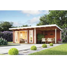 Abri de jardin moderne avec terrasse, mobilier de jardin et chemin pavé
