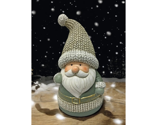 Dekorativer Weihnachtsmann mit Strickmütze als festliche Dekoration