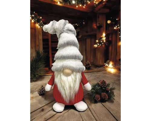 Dekorativer Weihnachtswichtel mit Bart und Mütze als festliche Dekoration