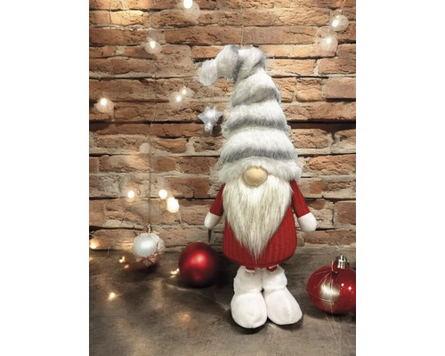 Dekorativer Weihnachtswichtel mit Mütze und Bart als festliche Dekoration