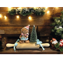 Décoration de Noël avec bonhomme en pain d’épices, sapin de Noël miniature et rouleau à pâtisserie