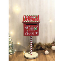 Boîte aux lettres de Noël rouge avec l''inscription Je crois au Père Noël sur un support rayé rouge et blanc