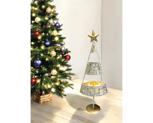 Sapin de Noël décoratif en métal avec étoile au sommet, à côté d''un sapin de Noël décoré.