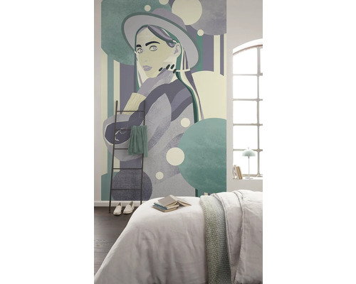 Chambre avec papier peint photo représentant une femme avec un chapeau