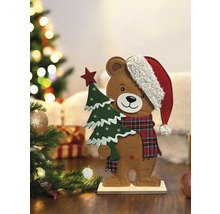 Dekorative Bärenfigur mit Weihnachtsmütze und Weihnachtsbaum für die Weihnachtszeit