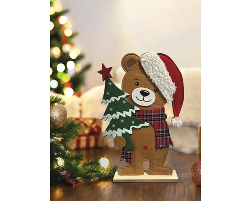 Dekorative Bärenfigur mit Weihnachtsmütze und Weihnachtsbaum für die Weihnachtszeit