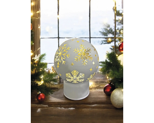Dekorative Schneekugel mit Schneeflockenmuster für die Weihnachtszeit