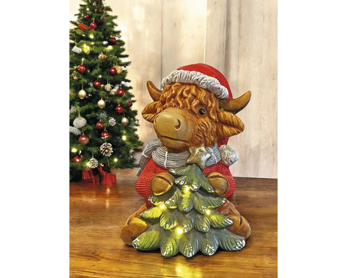 Figurine décorative de vache avec bonnet de Noël et sapin illuminé pour une décoration festive