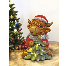 Vache décorative avec bonnet de Père Noël et sapin de Noël