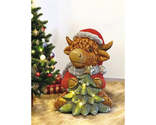 Vache décorative avec bonnet de Père Noël et sapin de Noël