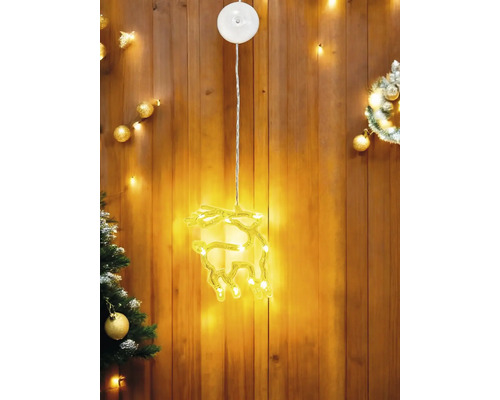 Weihnachtsdekoration mit einem leuchtenden Rentier-Motiv