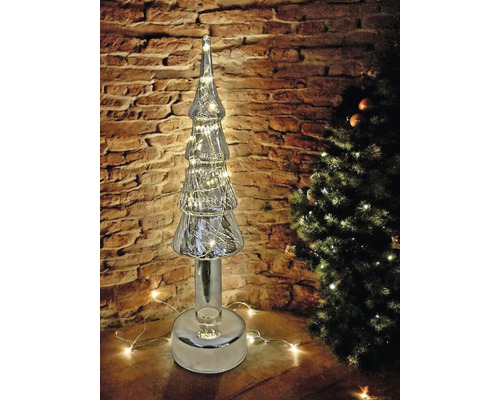 Dekorativer Weihnachtsbaum aus Glas mit Beleuchtung als festliche Dekoration