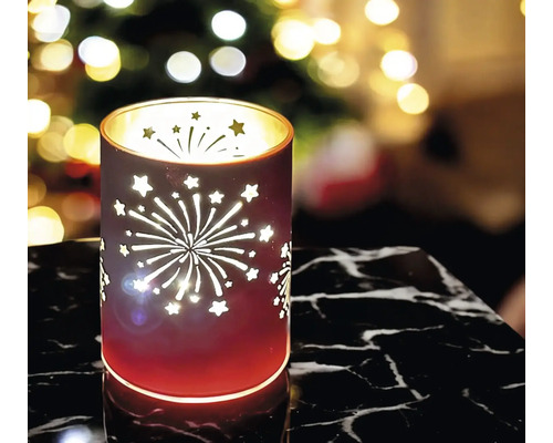 Windlicht mit Stern- und Feuerwerksmotiven für festliche Dekoration