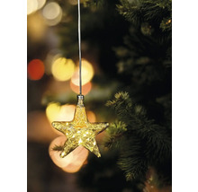 Sternförmiger Christbaumschmuck mit Beleuchtung an einem Weihnachtsbaum