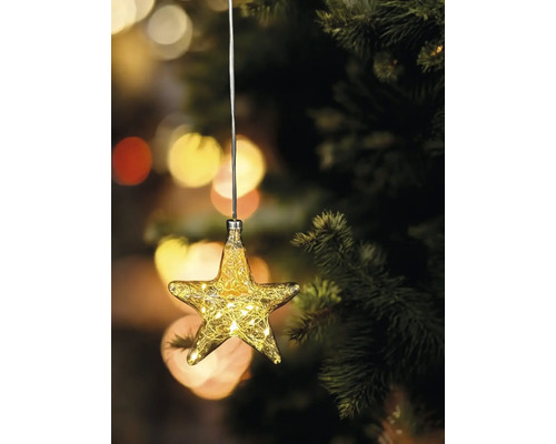 Décoration de sapin de Noël en forme d''étoile avec éclairage sur un sapin de Noël