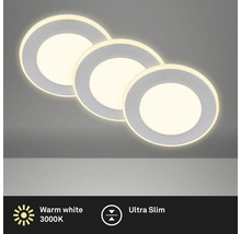 Trois plafonniers ronds à LED avec une lumière blanche chaude.