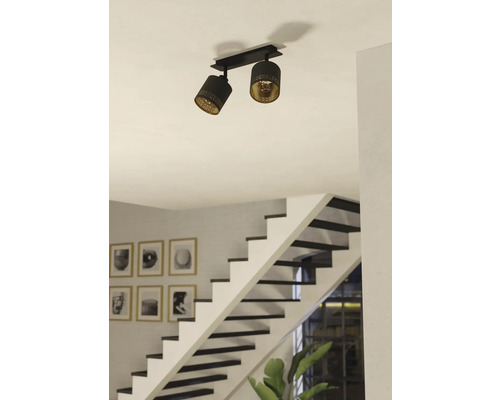 Deckenleuchte mit zwei Strahlern und dekorativen Mustern