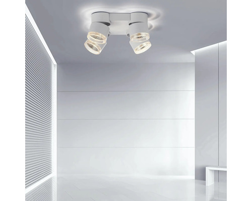 Deckenleuchte mit zwei Strahlern in einem hellen Raum