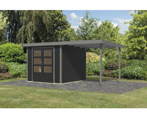 Abri de jardin avec annexe sur une pelouse