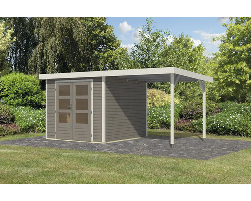 Abri de jardin en bois avec carport sur pelouse