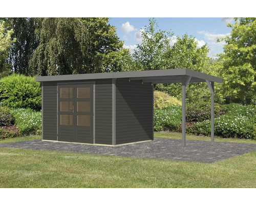 Abri de jardin en bois avec annexe sur pelouse