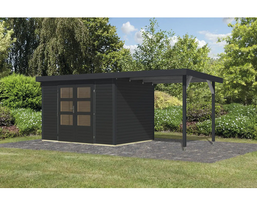 Abri de jardin en bois avec annexe dans le jardin