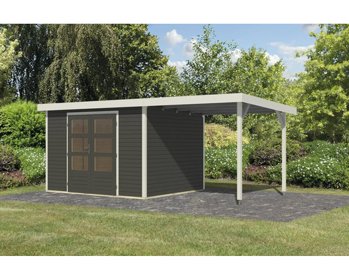 Abri de jardin avec annexe et porte double dans le jardin