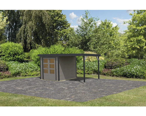 Gartenhaus mit Anbau vor Bäumen und Büschen