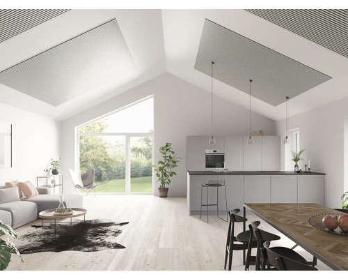 Espace de vie lumineux avec cuisine ouverte, panneaux de plafond et grande baie vitrée.