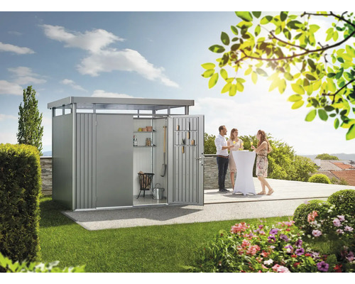 Armoire de jardin en métal avec portes ouvertes et personnes faisant la fête dans le jardin