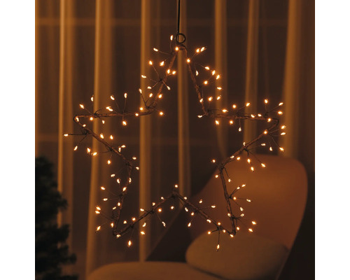 Décoration de Noël en forme d''étoile avec de nombreuses petites lumières.