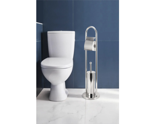 Badezimmer mit Toilette und Toilettenpapierhalter mit Bürstengarnitur