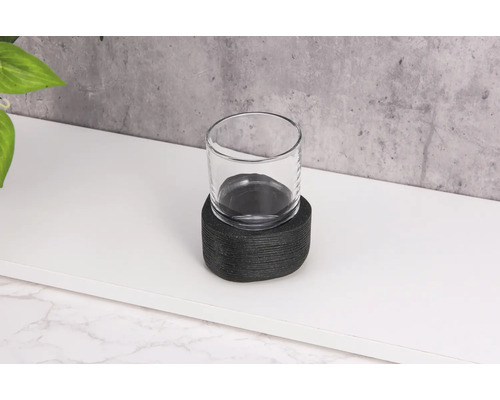 Photophore avec dessus en verre sur une table