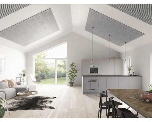 Salon lumineux avec panneaux acoustiques au plafond, canapé, table à manger et cuisine