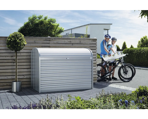 Cache-poubelle biohort StoreMax 160, 163x78x120 cm argenté-métallisé Abri de jardin métallique avec volet roulant et deux personnes avec des vélos