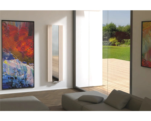 Salon moderne avec radiateur à miroir, tableau et canapé pour une ambiance élégante.