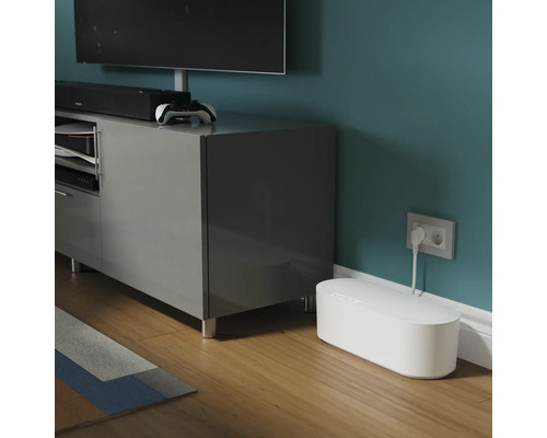 Wohnzimmer mit Fernsehschrank und Kabelbox zur Kabelaufbewahrung