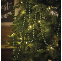 Sapin de Noël avec guirlande lumineuse et collier de perles