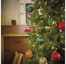Weihnachtsbaum geschmückt mit Christbaumkugeln und Figuren