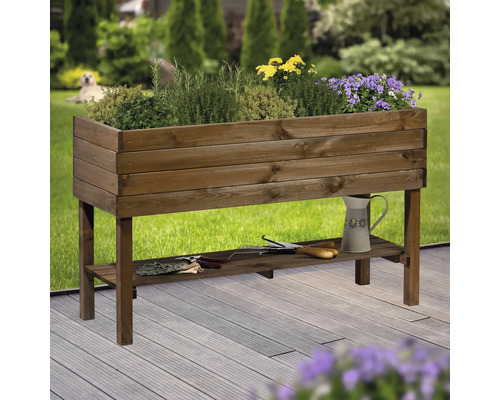 Hochbeet aus Holz mit Ablagefläche und Pflanzen