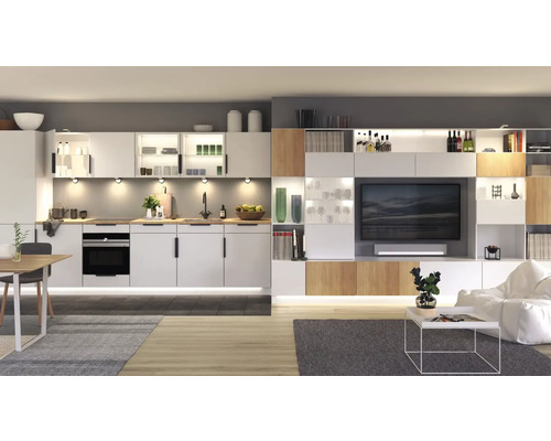 Cuisine-salon lumineuse avec kitchenette, meuble mural et coin salon