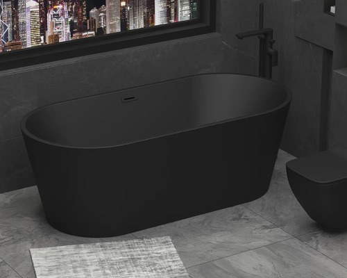 Baignoire autoportante et toilettes dans une salle de bains moderne avec fenêtre et vue sur la ville.