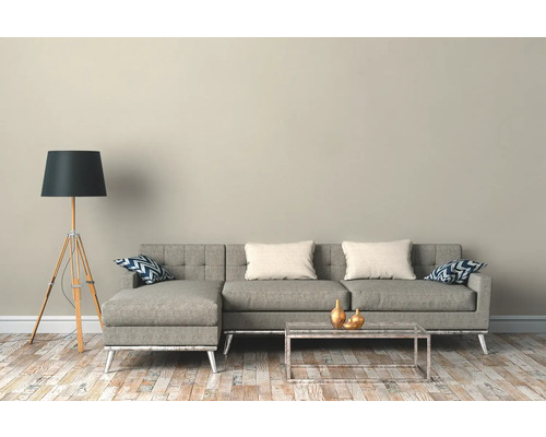 Wohnzimmer mit grauem Ecksofa, Stehlampe und Couchtisch