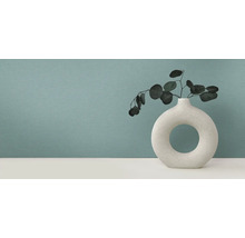 Vase décorative avec plantes sur table