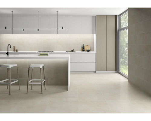 Cuisine moderne avec îlot de cuisine, tabourets de bar et carrelage