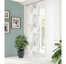 Panneau coulissant décoratif avec motif de cercles devant la fenêtre